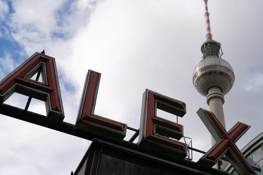 The TV tower and the lettering Alexanderplatz at the train station in Berlin