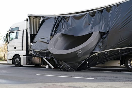Accident of a heavy-duty transporter in the city center of Magdeburg. The cargo slipped and crashed onto the road