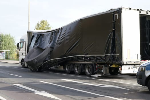 Accident of a heavy-duty transporter in the city center of Magdeburg. The cargo slipped and crashed onto the road
