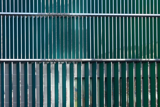 The close-up of a modern shiny plastic wall cladding.