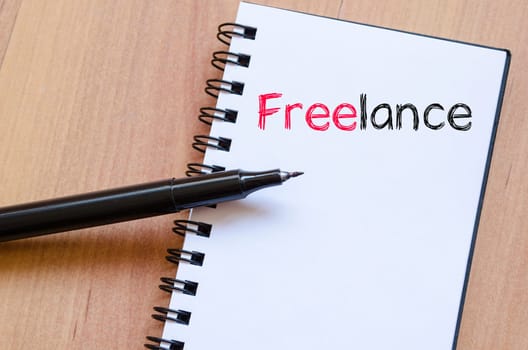 Freelance text concept write on notebook