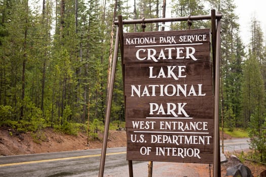 A temporary sign marking the entrance to Crater Lake United States
