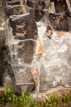 Primitive rock drawings hundreds of years old we call Petroglyphs