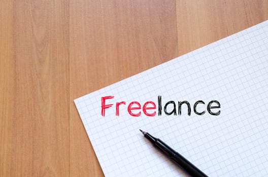 Freelance text concept write on notebook