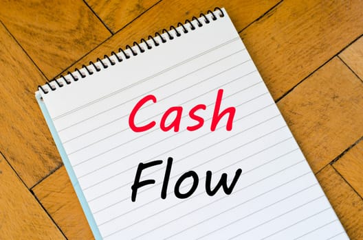 Cash flow text concept write on notebook