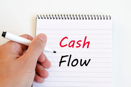Cash flow text concept write on notebook