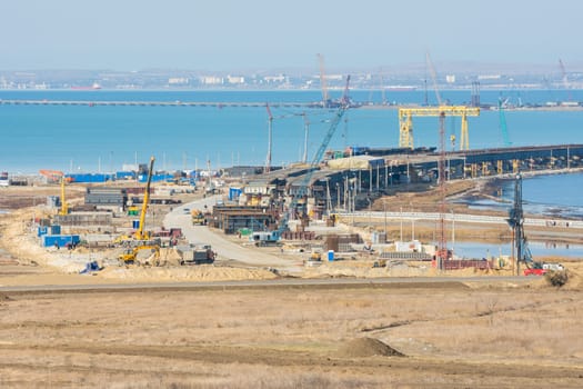 Taman, Russia - November 5, 2016: Construction of a bridge across the Kerch Strait, a view of the top of the bridge from the Taman Peninsula, as of November 2016