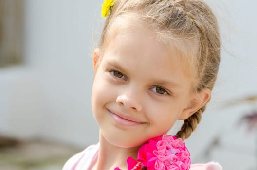 Close-up portrait of a beautiful six year old girl