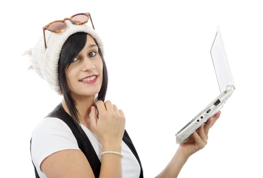 young brunette girl with a laptop isolated on white background