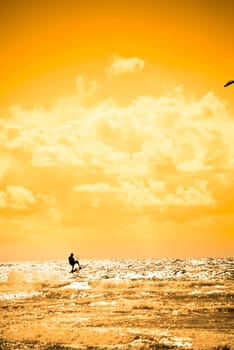 extreme kite surfer jumping waves at beach in ballybunion county kerry ireland on the wild atlantic way