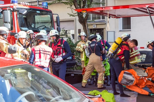 Berlin, Germany - Sept 19: Big coordinated intervention of paramedics, police, and firefighters when chemical accident happened in school in Kreuzberg on 19th of September ,2016 in Berlin, Germany.