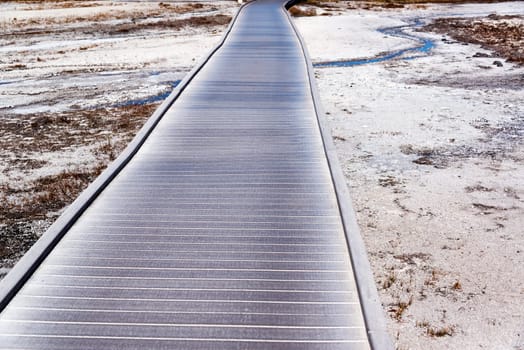 Boardwalk in Yellowstone National Park passing through the Upper Geyser Basin