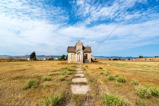 Wide angle view of an old abandoned house in Ovid, Idaho