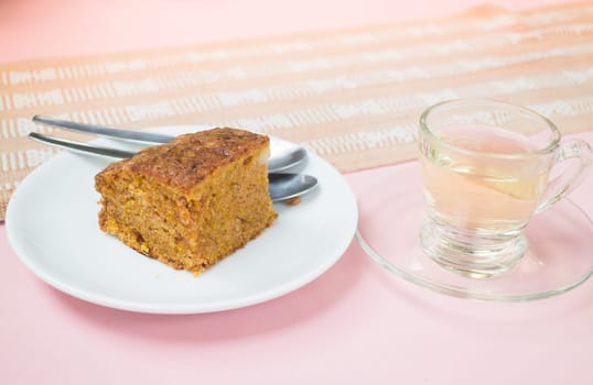 Hot tea and carrot cake, stock photo