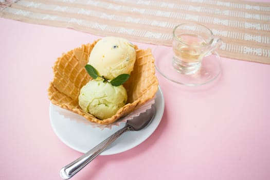 Homemade ice cream scoops in waffle bowl, stock photo