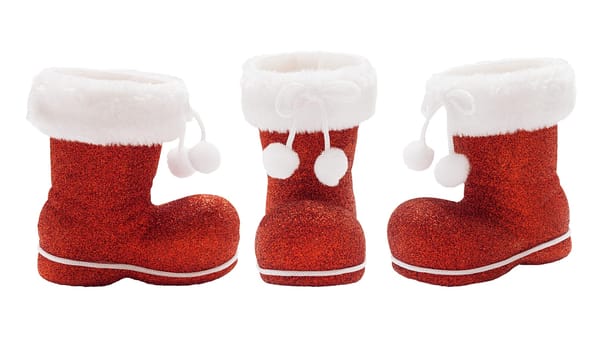 Set of empty red boots of Santa Claus isolated