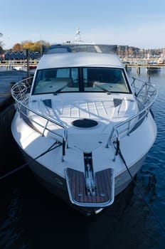 one big motorboat Yacht in the marina waiting to come up on land
