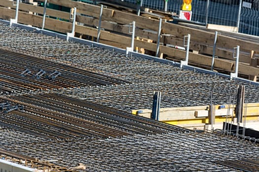 Foundation construction made of steel and concrete for the construction of an apartment building with underground parking. .