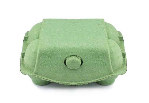 Front view of closed green cardboard six egg pack isolated on white background