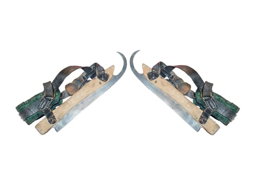 Two old wooden skates insulated on white.