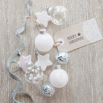Christmas baubles and other decorations for Christmas on a wooden background