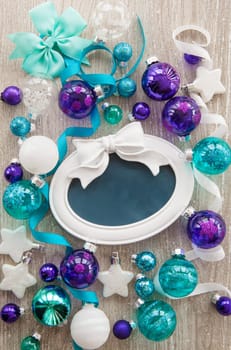 Christmas baubles and other decorations for Christmas on a wooden background