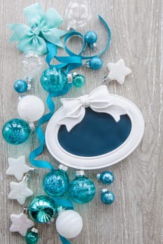 Christmas baubles and other decorations for Christmas on a wooden background