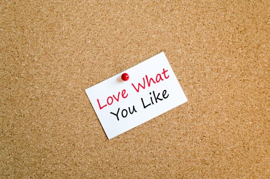 Sticky note on cork board background and text concept