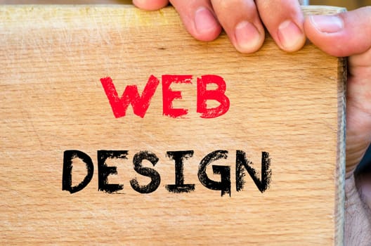 Human hand over wooden background and web design text concept