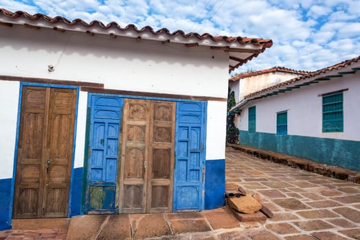 Old rustic doors and colonial architecture in the colonial town of Barichara, Colombia