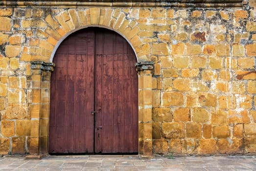 Entrance to San Roque chapel in the small town of Valle de San Jose, Colombia