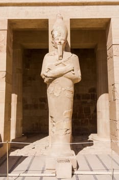 The temple of Hatshepsut near Luxor in Egypt.  Statues on facade of palace of Hatshepsut