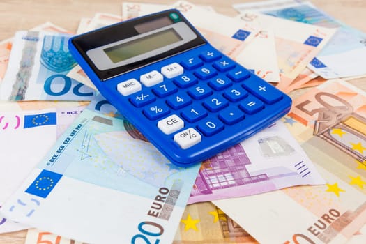 Calculator on the Euro.  Accounting concept.  Saving money