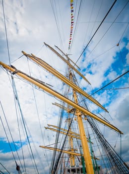 Detail of a sailboat rigging.  Mast on traditional sailboats. Mast of large wooden ship.