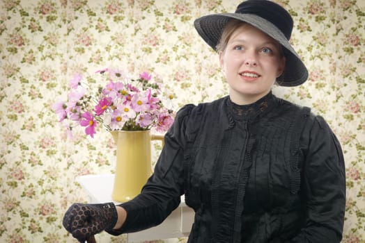young woman in vintage costume 1900s