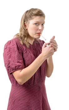 pretty young woman with clothes 1940 smoke a cigarette
