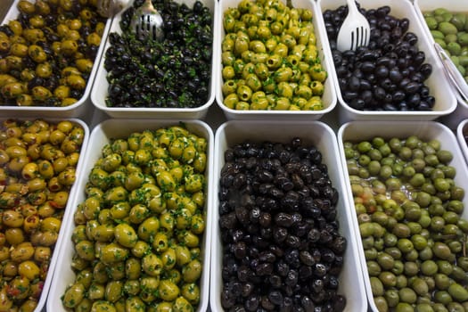various olives for sale at a market