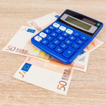 Calculator on the Euro.  Accounting concept.  Saving money