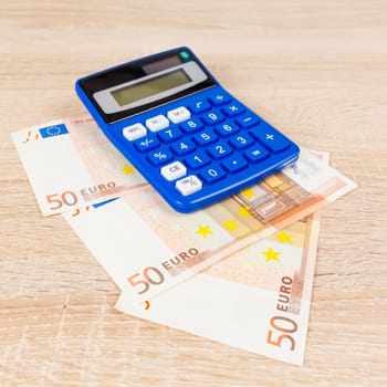 Calculator on the Euro.  Accounting concept.  Saving money