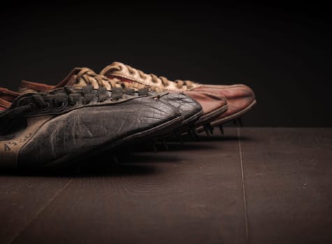 Grandpa's sport shoes on a wooden floor
