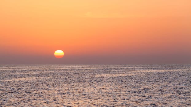 beautiful sunset above the sea.  Colorful sunset over water surface