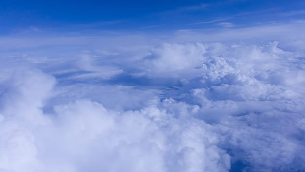 Sky clouds.  Over the Clouds.  Cloudscape. Blue sky and white cloud. Cumulus cloud