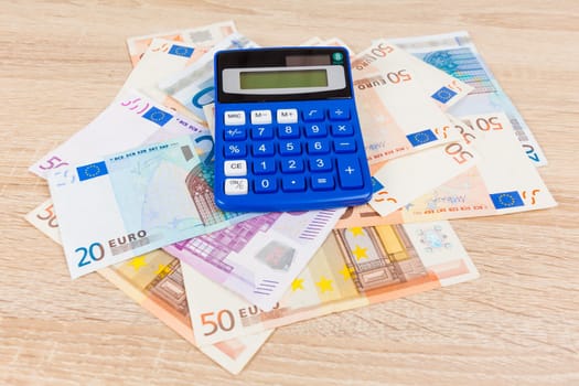 Calculator on the Euro.  Accounting concept.  Saving money