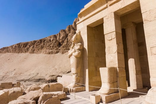The temple of Hatshepsut near Luxor in Egypt.  Statues on facade of palace of Hatshepsut