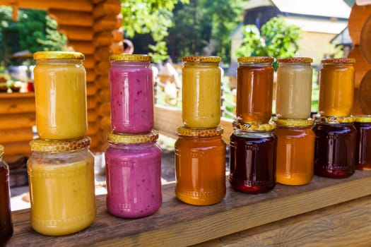 jars with honey,  Honey in jar with honey dipper
