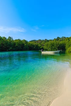 Boat on the beach. Vacation holidays background.  tropical beach