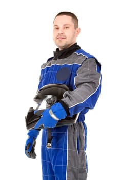 Racing driver posing with helmet isolated in white
