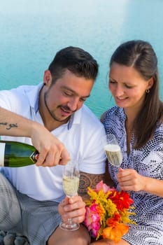 Happy young couple with champagne glasses,engagement,Bavaria,Germany