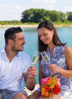 Happy young couple with champagne glasses,engagement,Bavaria,Germany