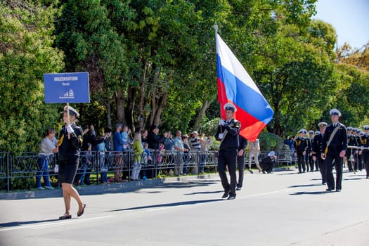 RUSSIA, SOCHI - SEPTEMBER 24, 2016 :SCF Black Sea Tall Ships Regatta 2016. Ship teams parade from sailing ships